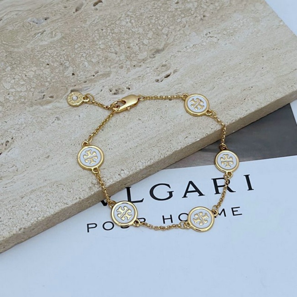 Tory Burch Gold and White Logo Bracelet